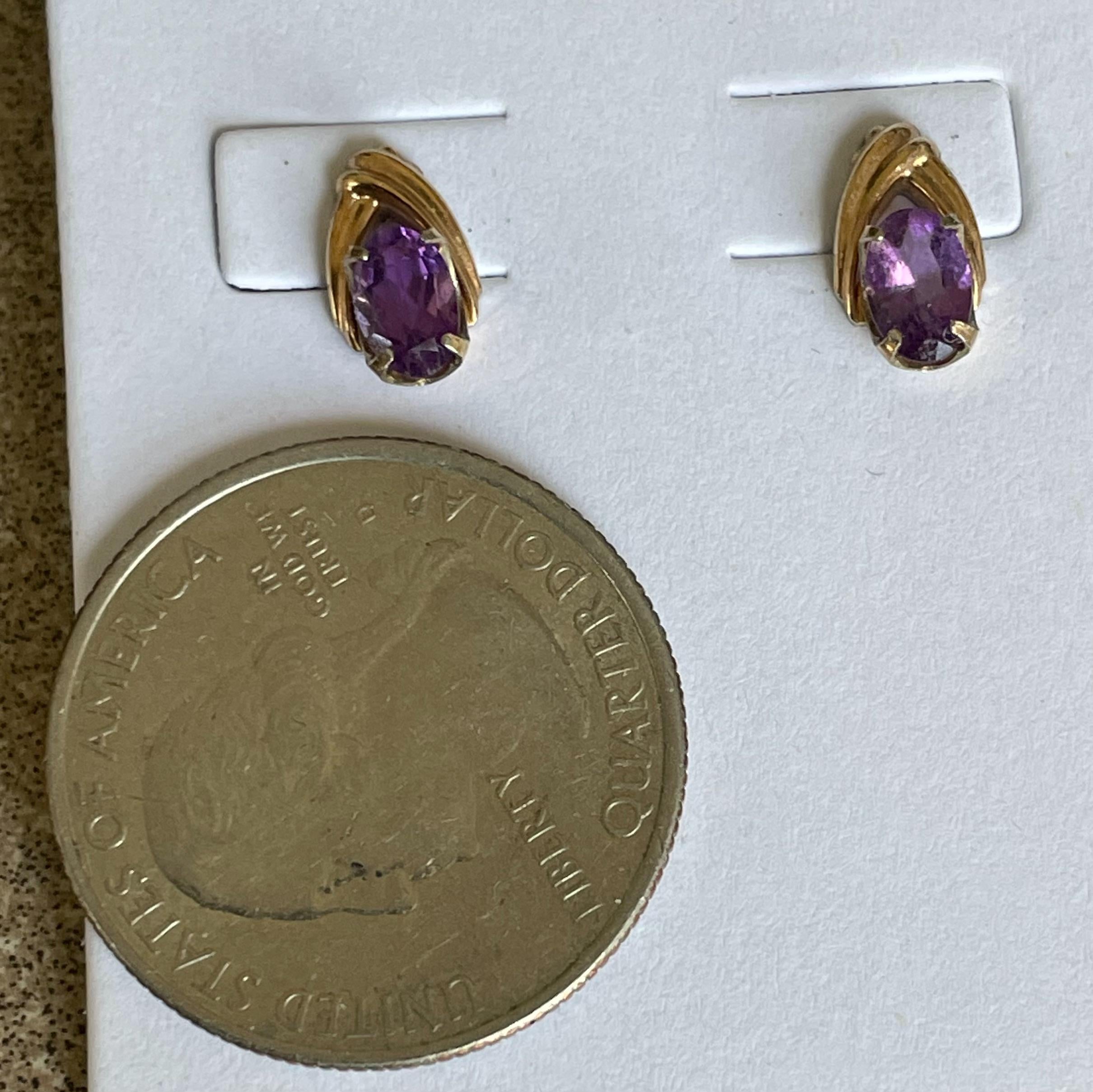 Stunning Purple Amethyst Set in 14k Gold Posts Signed Krementz on the backs.