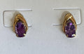 Stunning Purple Amethyst Set in 14k Gold Posts Signed Krementz on the backs.