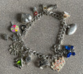 Vintage Sterling Silver Charm Bracelet with 15 Charms Enamel Precious Stones Rhinestones Marked 925