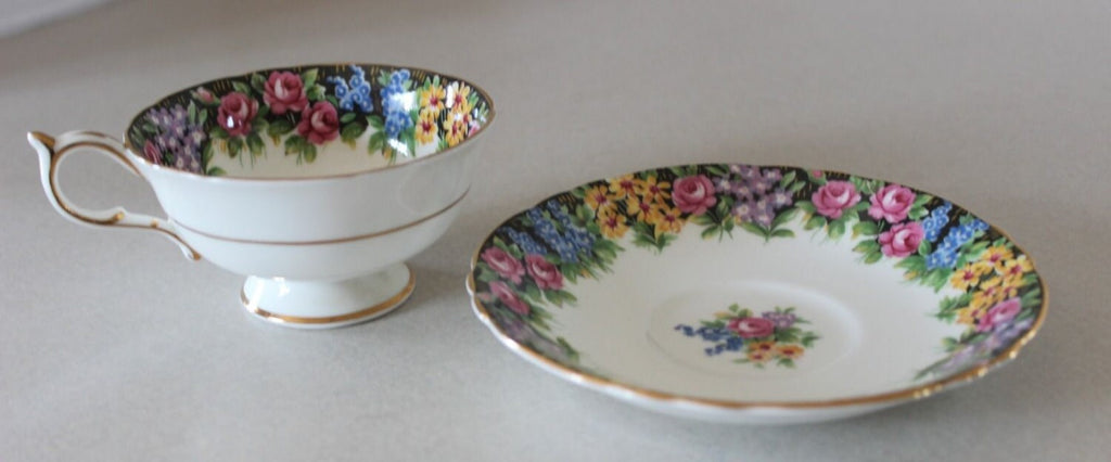 Stunning Paragon Tea Cup and Saucer Floral Garden w Roses
