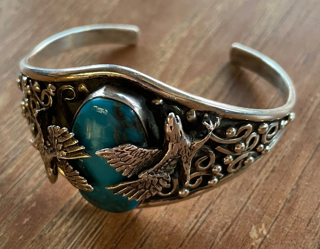 Native American Turquoise and Sterling Silver Cuff Bracelet Artist Signed With Eagles